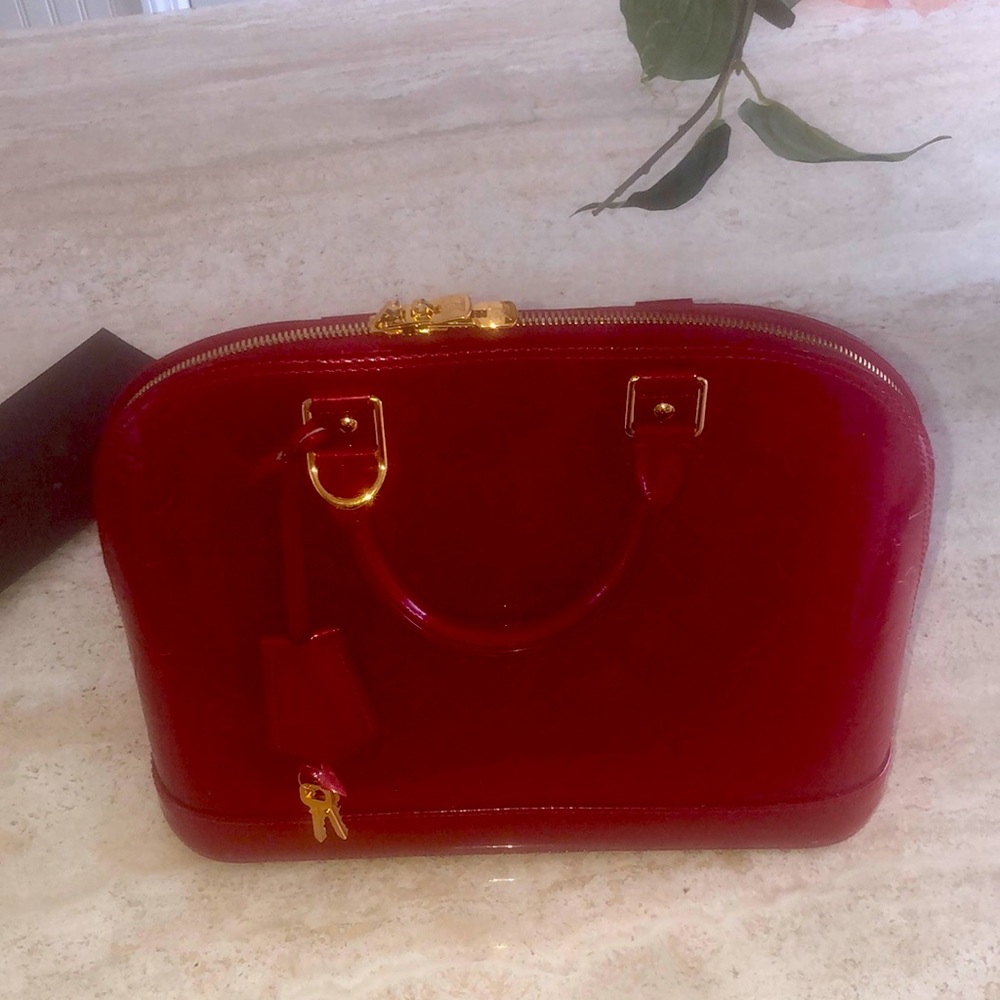Louis Vuitton alma pm red